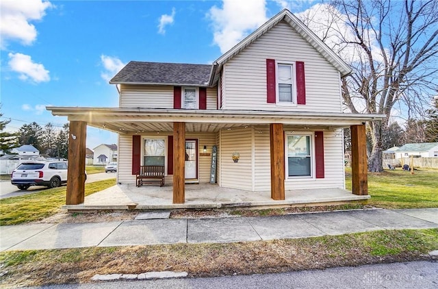 view of front of property featuring covered porch