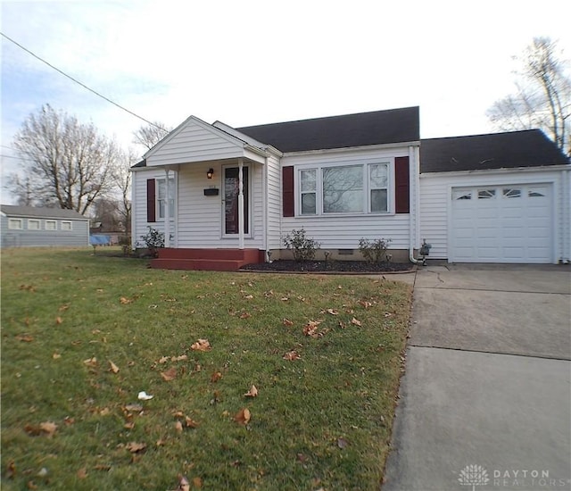 single story home with a garage and a front yard