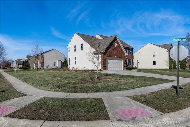 view of front of home with driveway, a garage, a residential view, and a front lawn