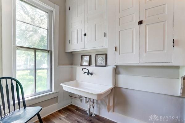 201 E Somers St, Eaton, OH 45320 - home office featuring plenty of natural light, dark wood-style flooring, and a sink