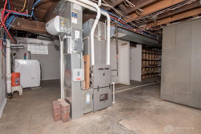 basement featuring washer and clothes dryer