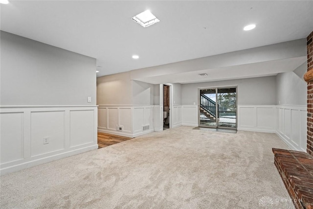 basement with light carpet