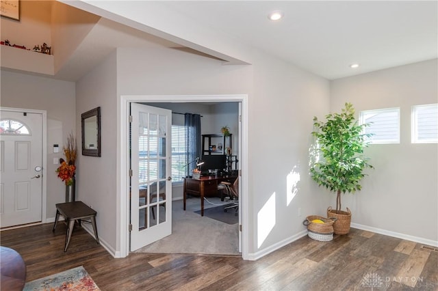 entrance foyer with dark wood-type flooring