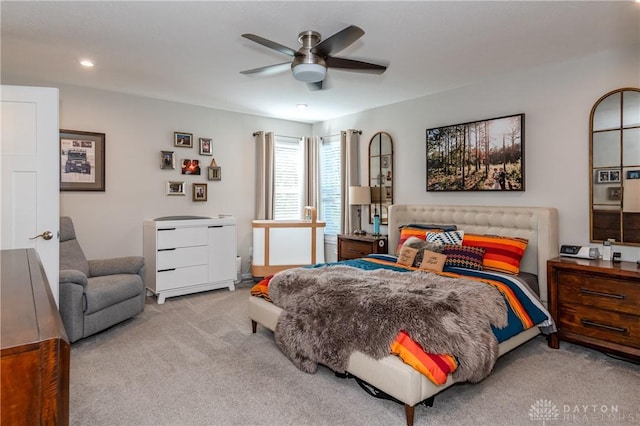 carpeted bedroom with ceiling fan