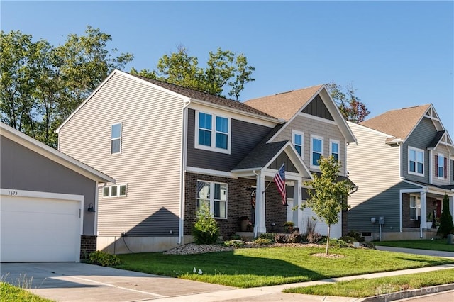 view of front of home featuring a garage and a front lawn