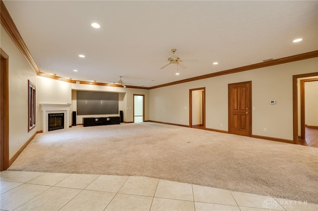 unfurnished living room featuring carpet flooring, recessed lighting, a fireplace, and ceiling fan