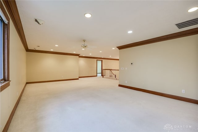 unfurnished room featuring visible vents, baseboards, recessed lighting, a ceiling fan, and light carpet