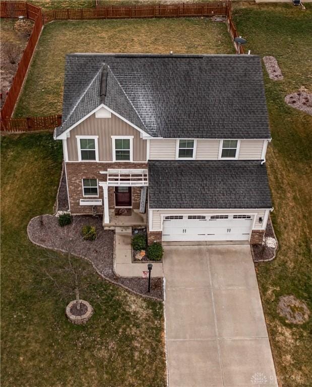 view of front of property with a garage