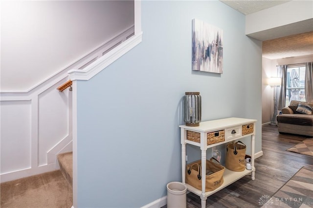 stairway with wood-type flooring