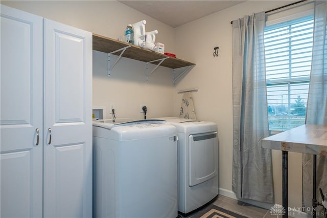 laundry area featuring hardwood / wood-style floors and washer and dryer