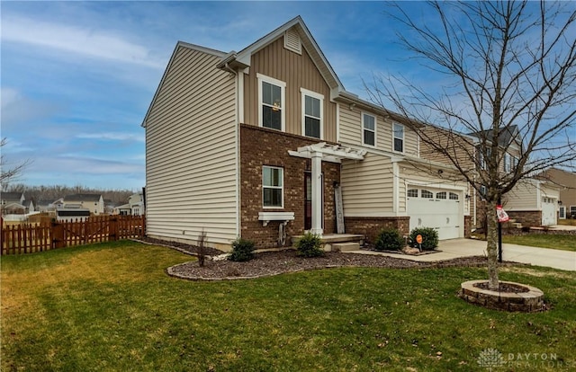 view of front of home featuring a garage and a front lawn