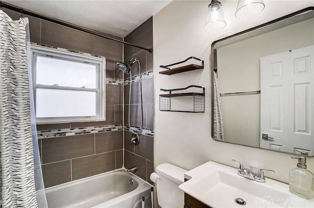 full bathroom featuring vanity, shower / tub combo, and toilet