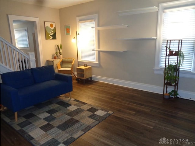 living room featuring dark hardwood / wood-style floors