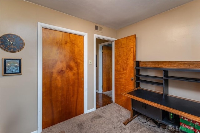 interior space featuring carpet flooring