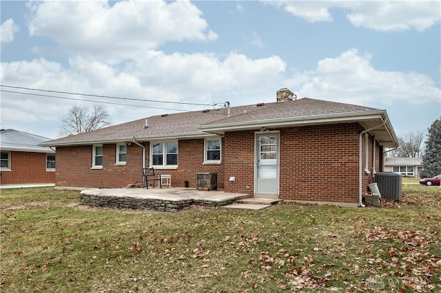 back of house with cooling unit, a lawn, and a patio