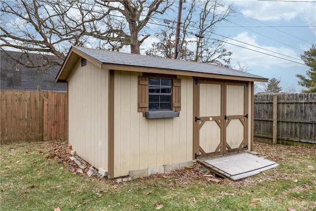 view of outdoor structure featuring a yard