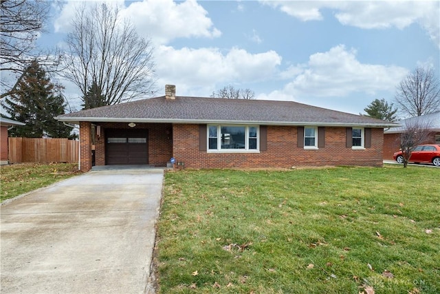 ranch-style home with a carport and a front lawn