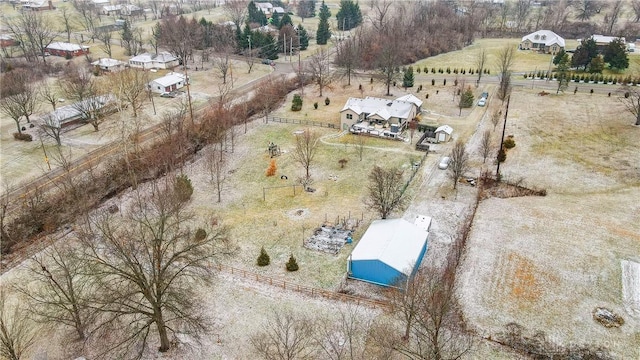 birds eye view of property featuring a rural view