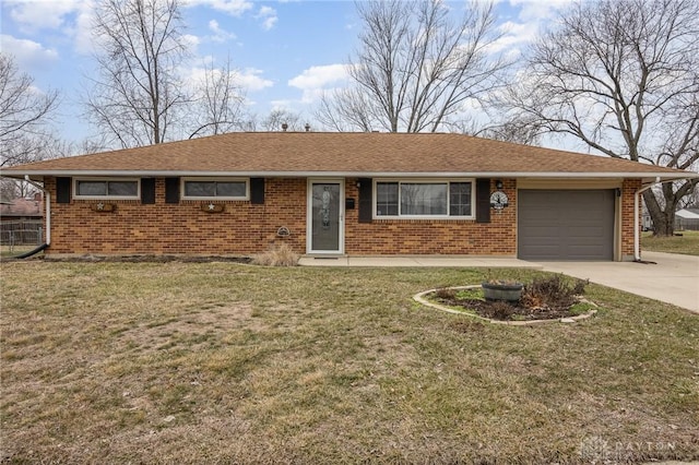 single story home featuring a garage and a front yard