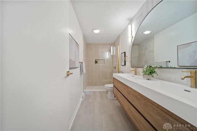 4260 Penny Pike, German Twp, OH 45502 - full bath featuring toilet, walk in shower, double vanity, baseboards, and tile patterned flooring