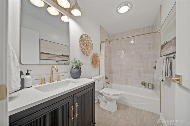 4260 Penny Pike, German Twp, OH 45502 - bathroom featuring shower / tub combination, vanity, and toilet