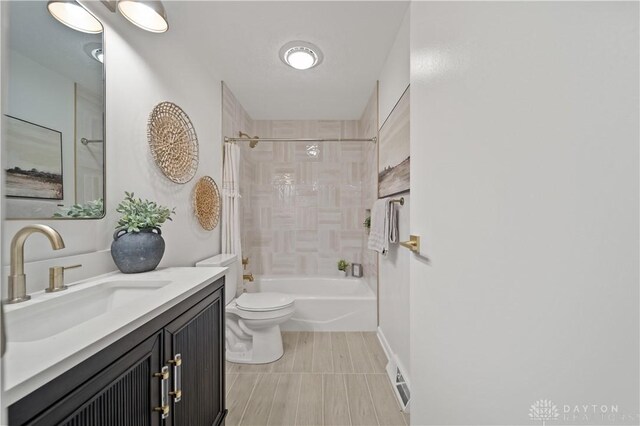 4260 Penny Pike, German Twp, OH 45502 - full bath with toilet, bathtub / shower combination, vanity, and baseboards