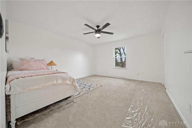 4260 Penny Pike, German Twp, OH 45502 - bedroom with carpet, baseboards, and a ceiling fan