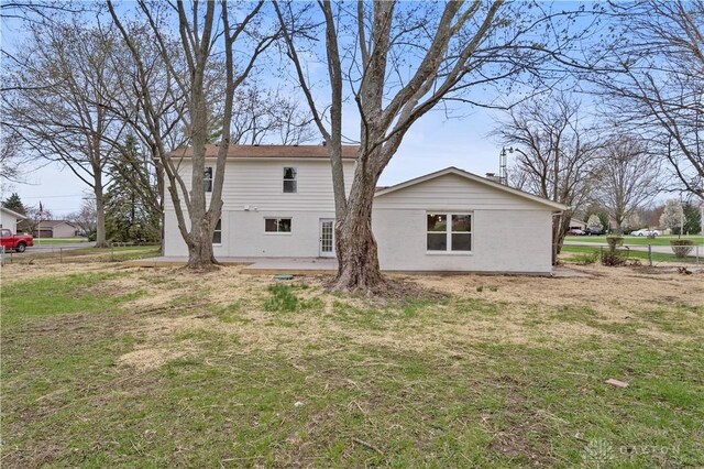 4260 Penny Pike, German Twp, OH 45502 - back of property featuring a lawn and stucco siding