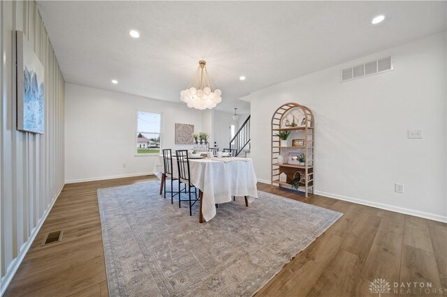 4260 Penny Pike, German Twp, OH 45502 - dining space with a chandelier, dark wood-style flooring, recessed lighting, and baseboards