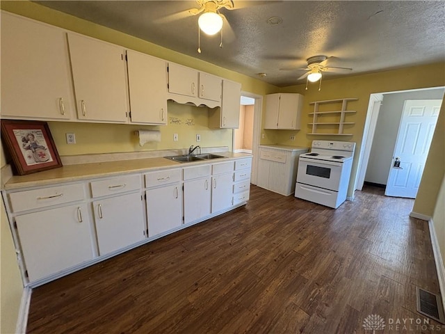 kitchen with visible vents, a sink, dark wood-type flooring, a textured ceiling, and white electric range