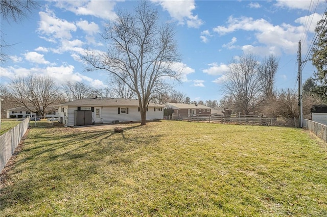 view of yard featuring a patio area and a fenced backyard