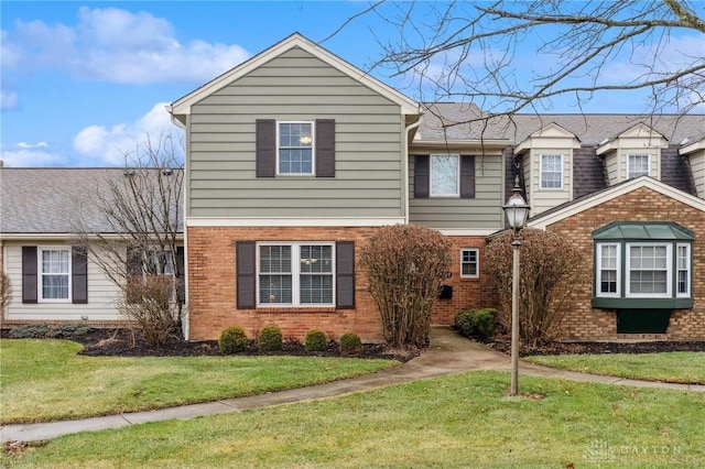 view of front of home with a front yard