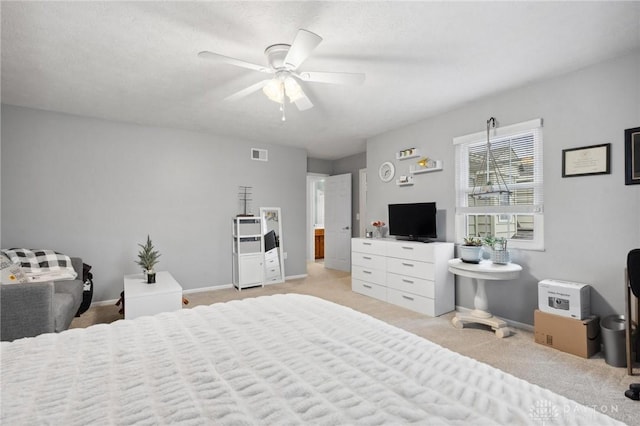 7789 Thomas Jefferson Ln, Centerville, OH 45459 - bedroom featuring baseboards, light carpet, a ceiling fan, and visible vents