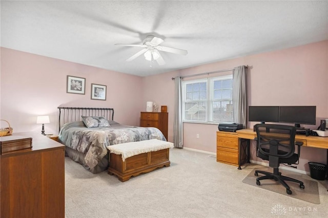 7789 Thomas Jefferson Ln, Centerville, OH 45459 - bedroom with baseboards, ceiling fan, and light carpet