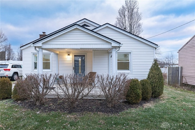 bungalow-style home featuring covered porch