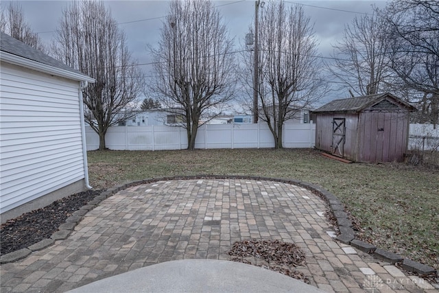 view of patio / terrace featuring a storage shed