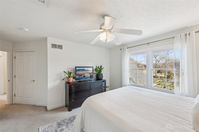 2769 Golden Fox Trl, Lebanon, OH 45036 - bedroom with baseboards, a ceiling fan, light colored carpet, and visible vents