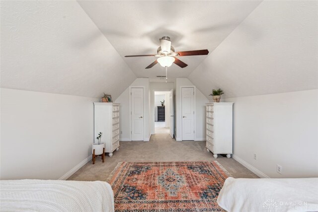 2769 Golden Fox Trl, Lebanon, OH 45036 - bedroom featuring light colored carpet, a ceiling fan, baseboards, and lofted ceiling