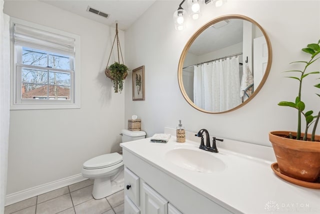 2769 Golden Fox Trl, Lebanon, OH 45036 - full bath featuring visible vents, tile patterned flooring, vanity, toilet, and baseboards