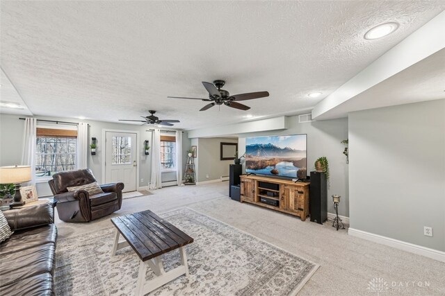 2769 Golden Fox Trl, Lebanon, OH 45036 - living area featuring ceiling fan, a textured ceiling, light colored carpet, baseboards, and recessed lighting