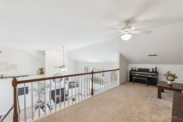 2769 Golden Fox Trl, Lebanon, OH 45036 - interior space with a ceiling fan, visible vents, carpet, and lofted ceiling