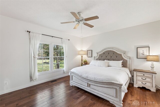 2769 Golden Fox Trl, Lebanon, OH 45036 - bedroom with baseboards, ceiling fan, wood-type flooring, and visible vents