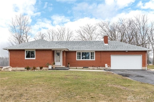 single story home with a garage and a front yard