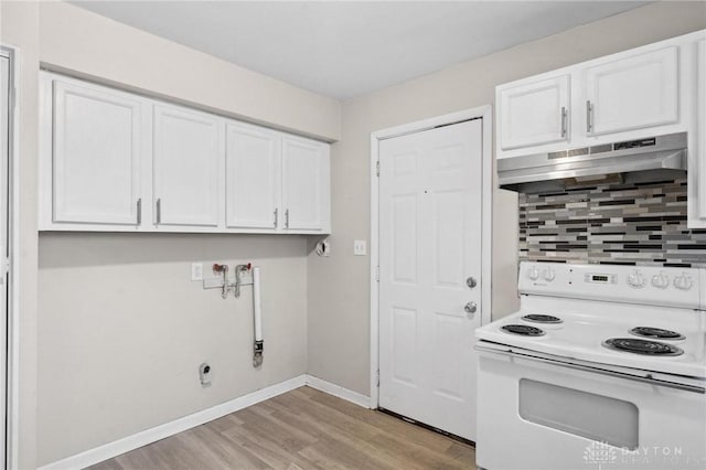 kitchen with electric stove, backsplash, white cabinetry, and light hardwood / wood-style flooring