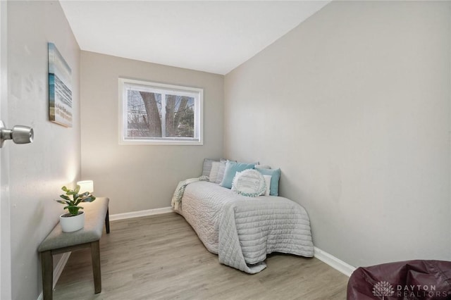 bedroom featuring light wood-type flooring