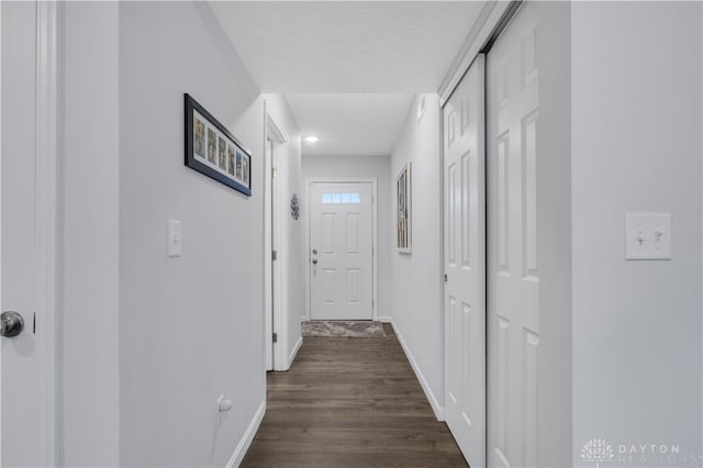 1605 Ashbury Ct, Franklin, OH 45005 - corridor with a textured ceiling, dark wood finished floors, and baseboards