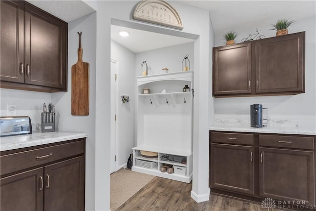 mudroom with dark hardwood / wood-style flooring