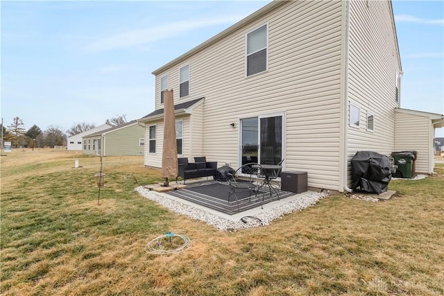 rear view of house with a yard, a patio area, and outdoor lounge area