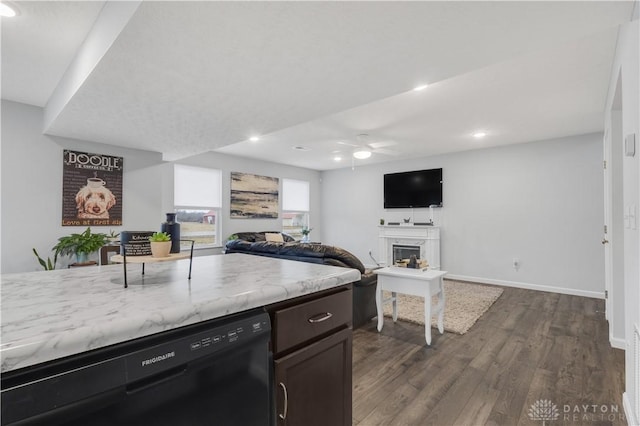 1605 Ashbury Ct, Franklin, OH 45005 - kitchen featuring ceiling fan, a premium fireplace, dark wood-style flooring, black dishwasher, and light countertops
