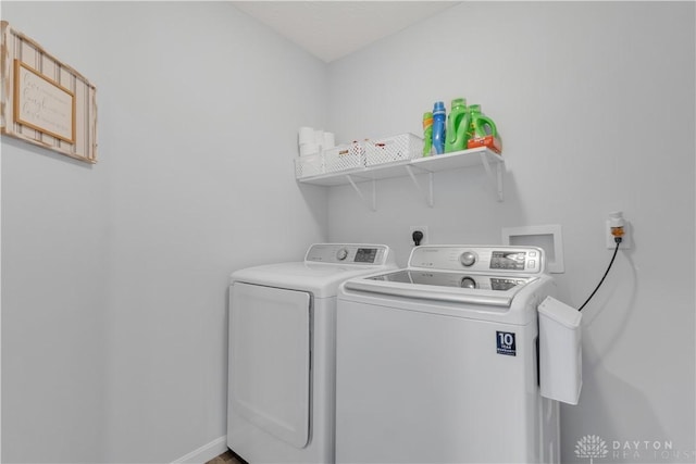 laundry area featuring washing machine and dryer